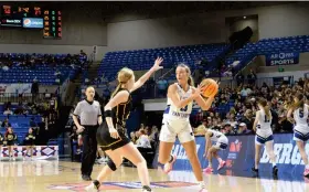  ?? (The Sentinel-Record/Donald Cross) ?? Bergman’s Ruby Trammell looks for the opening during Thursday’s Class 3A state finals game against Salem at Bank OZK Arena.