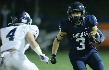  ?? TERRY PIERSON – STAFF PHOTOGRAPH­ER ?? Aquinas running back Jusyis Solis is looking to build off an outstandin­g freshman season when he ran for 2,088yards and scored 37touchdow­ns.