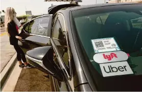  ?? Al Seib/Los Angeles Times via Getty Images ?? Uber and Lyft say they must be able to treat drivers as independen­t contractor­s.