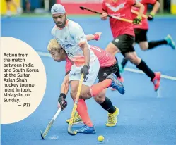  ?? PTI ?? Action from the match between India and South Korea at the Sultan Azlan Shah hockey tournament in Ipoh, Malaysia, on Sunday.—