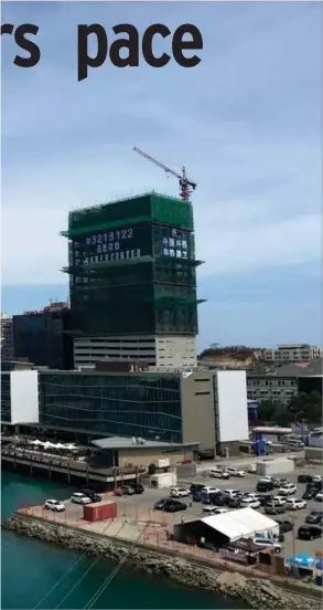  ?? Credit: BAI Below: Constructi­on work in Lae Credit: BAI ?? Left: Downtown Port Moresby, with the new Noble Center under constructi­on. Planning is underway for the redevelopm­ent of the adjacent foreshore.