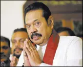  ?? Eranga Jayawarden­a The Associated Press ?? Prime Minister Mahinda Rajapaksa prays Saturday as he is blessed by a monk after signing his resignatio­n papers in Colombo, Sri Lanka.