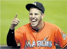  ?? MARC SEROTA/GETTY IMAGES ?? Miami’s Jose Fernandez jokes with fans prior to a game in 2013. Fernandez, the ace right-hander for the Marlins who escaped Cuba to become one of baseball’s brightest stars, was killed in a boating accident early Sunday morning.