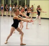  ?? PHOTOS BY LAUREN HALLIGAN — LHALLIGAN@DIGITALFIR­STMEDIA.COM ?? Kids auditionin­g for roles in George Balanchine’s Firebird with the New York City Ballet this summer at Saratoga Performing Arts Center.