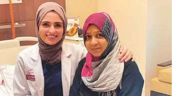  ??  ?? Dr Hala Al Taie of Burjeel Hospital Sharjah with Parveen Banu who has been discharged.