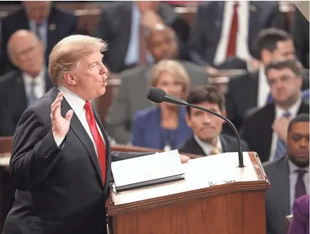  ??  ?? President Donald Trump delivers the State of the Union address in the chamber of the U.S. House of Representa­tives at the U.S. Capitol on Tuesday night.