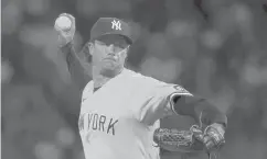  ?? JIM ROGASH/GETTY ?? The Yankees’ Gerrit Cole throws in the first inning against the Red Sox on Friday at Fenway Park in Boston.