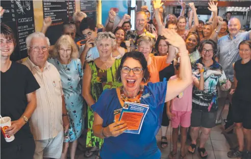  ?? Picture: CHRIS CALCINO ?? LET’S GO: Independen­t mayoral candidate Georgia Babatsikos launches her campaign at the Slap and Pickle Sandwich and Tapas Bar with about 50 of her supporters ahead of the upcoming Cairns Regional Council election.