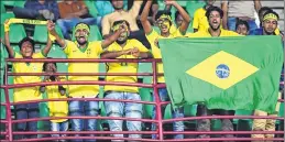  ?? AFP ?? Brazil fans celebrate at the end of their team's FIFA U-17 World Cup round of 16 win.