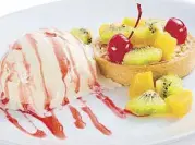  ??  ?? Cap your meal with this delicious Fruit Tart.