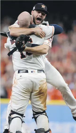  ?? ERIC CHRISTIAN SMITH/THE ASSOCIATED PRESS ?? Houston Astros pitcher Lance McCullers Jr., top, leaps in the arms of catcher Brian McCann after Saturday’s 4-0 Game 7 win over the New York Yankees in Houston.