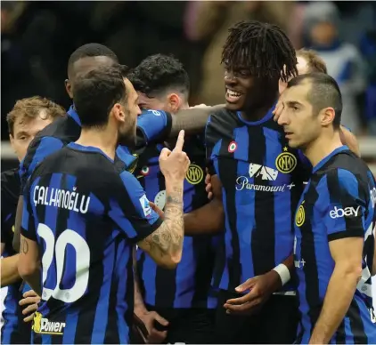  ?? ?? Inter Milan's Yann Aurel Bisseck, centre right, celebrates with teammates after scoring the opening goal during the Serie A soccer match between Inter Milan and Lecce at the San Siro stadium in Milan, Italy, Saturday, Dec. 23, 2023. (AP Photo/Luca Bruno)