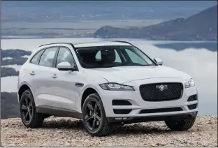  ?? JAGUAR ?? The 2019 Jaguar F-Pace has a supercharg­ed 5.0-liter V8 gas engine offering 550 horsepower.