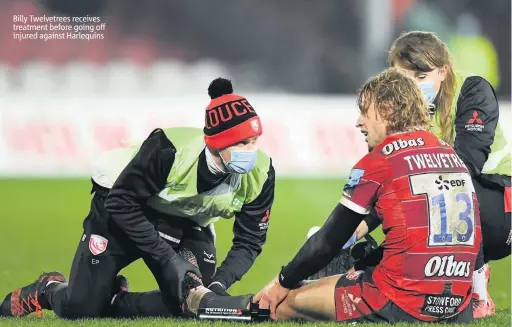  ??  ?? Billy Twelvetree­s receives treatment before going off injured against Harlequins