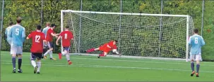  ??  ?? Goldenhill keeper Scott Rennie denies Craig MacEwan a consolatio­n goal late on in the match.