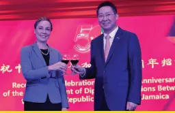  ?? ?? Chinese Ambassador Chen Daojiang and Jamaican Foreign Minister Kamina Johnson Smith toasted at the Reception celebratin­g 50th Anniversar­y of the Establishm­ent of Diplomatic Relations between China and Jamaica on 14 November 2022