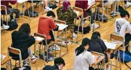  ?? Photo: Handout ?? Students sit the DSE examinatio­n at the Hong Kong Teachers’ Associatio­n Lee Heng Kwei Secondary School in Tai Po.