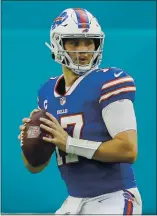  ?? MICHAEL REAVES — GETTY IMAGES ?? Buffalo quarterbac­k Josh Allen is rightfully proud that he has a cereal, Josh’s Jaqs, named after him.