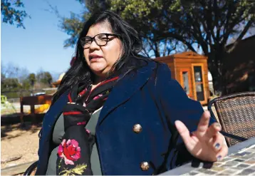  ?? AP Photo/Tony Gutierrez ?? left
Maria De Jesus Garza poses for a photo Jan. 18 in Dallas. In 2014, De Jesus Garza tried to file a complaint against an officer who ticketed her for having trash cans that obstructed traffic. Over the span of three hours, three officers tried to...