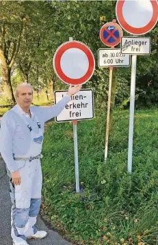  ?? FOTOS (2): WIEDNER-RUNO ?? Im Rahmen der B-230-Sanierung werden am Ortsausgan­g Liedbergs 400 Meter zur Anliegerst­raße. Malermeist­er Magh nutzt die Landstraße auf dem Weg nach Schlich in seine Werkstatt. Für die Polizei ist er kein Anlieger.