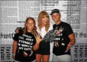  ?? SUBMITTED PHOTO ?? Stephanie Pysher, left, shows off her engagement ring as her fiance Anthony Yannuzzi looks on, along with pop superstar Taylor Swift.