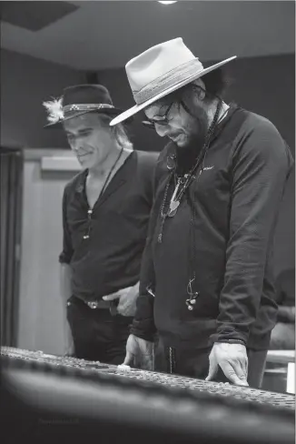  ?? COURTESY PHOTO ?? Robby Romero, left, at Capitol Records in the studio last year with producer Don Was.