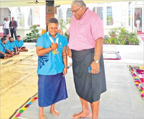  ?? ?? Weightlift­er Apolonia Vaivai meets the President at the State House yesterday.