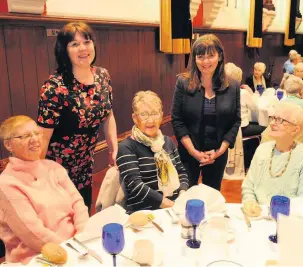  ??  ?? Meet and greet Councillor Janine Calikes and Clare Haughey MSP chat to diners