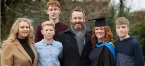  ??  ?? Blathnaid on her graduation day with husband Ciaran and their children, Sile, Darach, Peadar and Comhghal