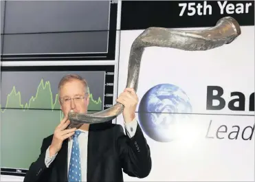  ?? PHOTO: SIMPHIWE MBOKAZI ?? Barloworld chief executive Clive Thompson celebrates the 75th anniversar­y of its listing on the JSE.