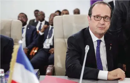  ??  ?? PARIS: French President Francois Hollande attends the handover ceremony of the Francophon­ie presidency between Senegal and Madagascar during the 16th “Sommet de la Francophon­ie” (Summit of French-speaking countries) yesterday.—AFP
