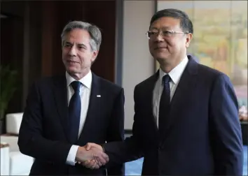  ?? Mark Schiefelbe­in/Associated Press ?? Secretary of State Antony Blinken, left, meets with Shanghai Party Secretary Chen Jining on Thursday at the Grand Halls in Shanghai, China.