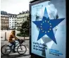  ?? AFP ?? LOOMING LARGE: A poster depicting the EU flag and a deemed image of Trump. —
