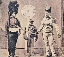  ?? PRIVATE COLLECTION ?? Ned Harrigan and Tony Hart in their roles as Mulligan Guards. There was always a young black actor in the Guards, usually carrying what they called "The Target." Souvenir photograph­s and cartes-de-visite featuring the Mulligans were hot sellers in the 1870s.