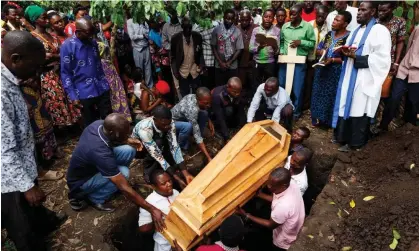  ?? Photograph: Luke Dray/EPA ?? The funeral on 18 June for one of the victims of the attack on a school in Mpondwe, Uganda in which at least 37 people were killed.