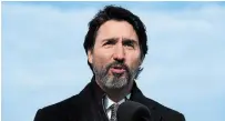  ?? SEAN KILPATRICK THE CANADIAN PRESS ?? “If you’re a country of the rule of law, if you’re a country of values, you need to stick up for those,” says Justin Trudeau.