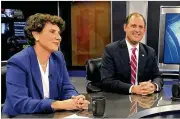  ?? ADAM BEAM / ASSOCIATED PRESS ?? Kentucky’s 6th Congressio­nal District candidates Amy McGrath and Andy Barr pose for photos before the start of a debate in Lexington, Ky.