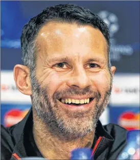  ?? Picture: PA ?? ALL SMILES: Giggs cut an engaging figure at his first press conference.