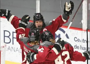  ?? THE CANADIAN PRESS GRAHAM HUGHES ?? Montreal’s Claire Dalton celebrates with teammates Laura Stacey and Marie-Philip Poulin after scoring against Ottawa during third period PWHL hockey action in Montreal on Feb. 24.