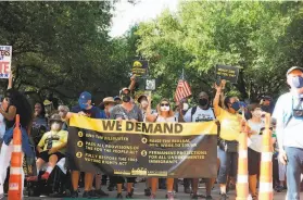  ?? Acacia Coronado / Associated Press ?? Activists rally for voting rights at the Capitol in Austin on July 31. Gov. Greg Abbott is seeking to pass a bill that would impose new restrictio­ns on voting.