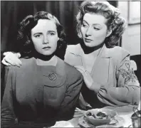  ?? THE ASSOCIATED PRESS ?? In this handout photo from 1942, Teresa Wright, left, and Greer Garson are shown in a scene from the movie “Mrs. Miniver.”