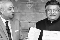  ?? PTI ?? Justice Srikrishna ( left) panel’s report on data protection, along with a draft privacy bill, was submitted to the government on Friday