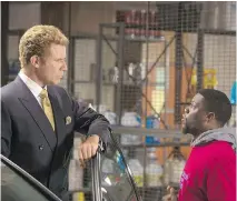  ?? PAT T I P E R R E T / WA R N E R B R O S . ?? Will Ferrell, left, and Kevin Hart star in Get Hard. The film aims for biting satire, but falls short.