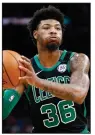  ?? (AP/Michael Dwyer) ?? Marcus Smart of the Boston Celtics revealed Thursday that he has tested positive for the coronaviru­s, bringing the number of NBA players who have acquired the virus to 10.