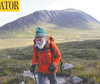  ?? RUSSELL CHEYNE/REUTERS ?? Climber Nick Gardner ascends Buachaille Etive Mor last week, one of Scotland's 282 `Munros', or mountains above
3,000 feet, which he has vowed to climb in honour of his wife, Janet, who is suffering from severe osteoporos­is.