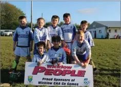  ??  ?? The Aughrim under-9s ahead of their hurling games in Carnew.