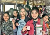  ?? — R. PAVAN ?? Women show their zero tickets while travelling in an RTC bus in Hyderabad on Friday.