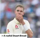  ??  ?? > A rueful Stuart Broad