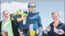  ?? All photograph­s above: John McFadyen. ?? Ladies’ half marathon winner Fiona Balfour, centre, with second placed Isabel Leming, left, and third placed Fiona Cook, right.