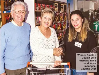  ??  ?? Winner Pauline Daykin with husband Mike and store manager, Zeynep Olur